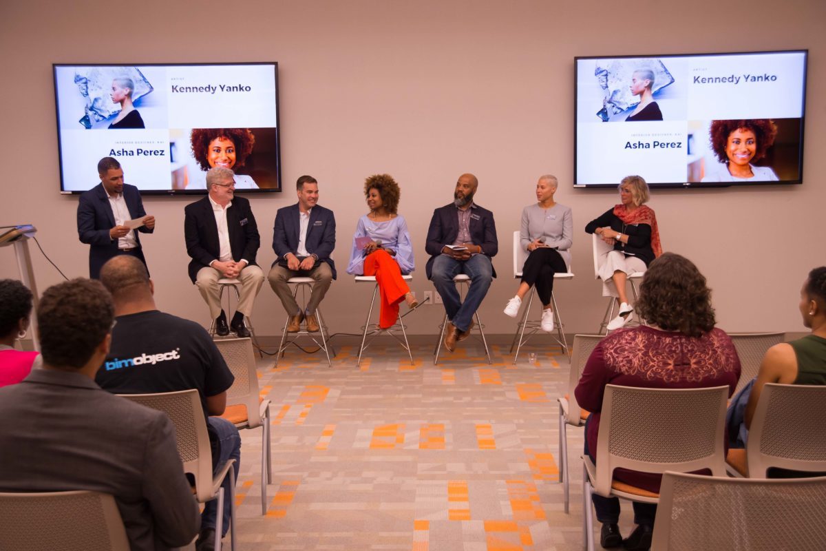 Panelists sitting on panel