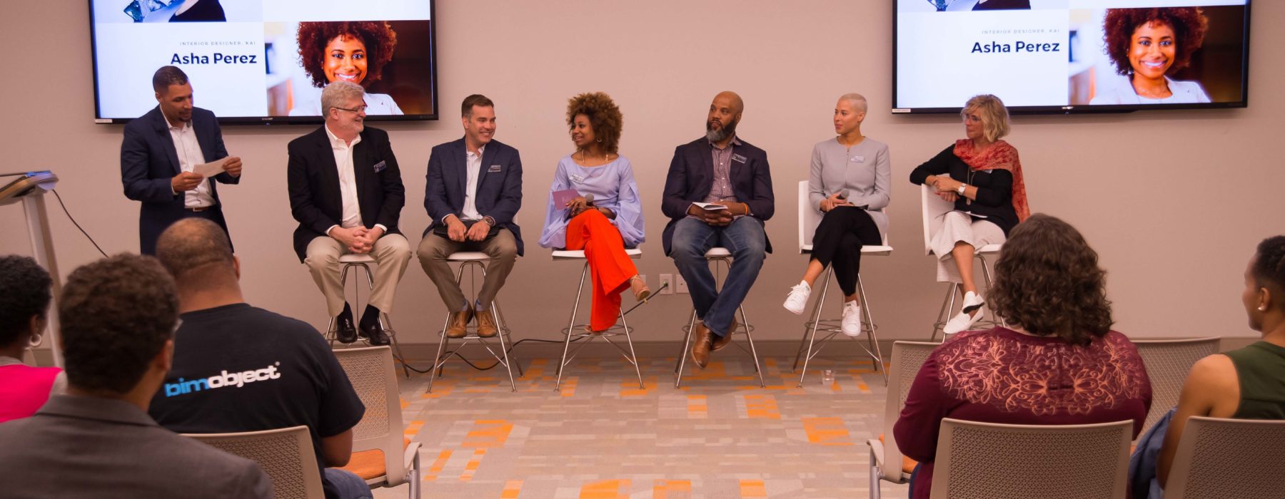Panelists sitting on panel