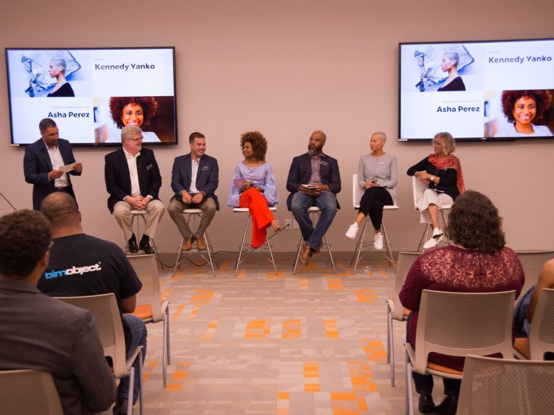 Panelists sitting on panel