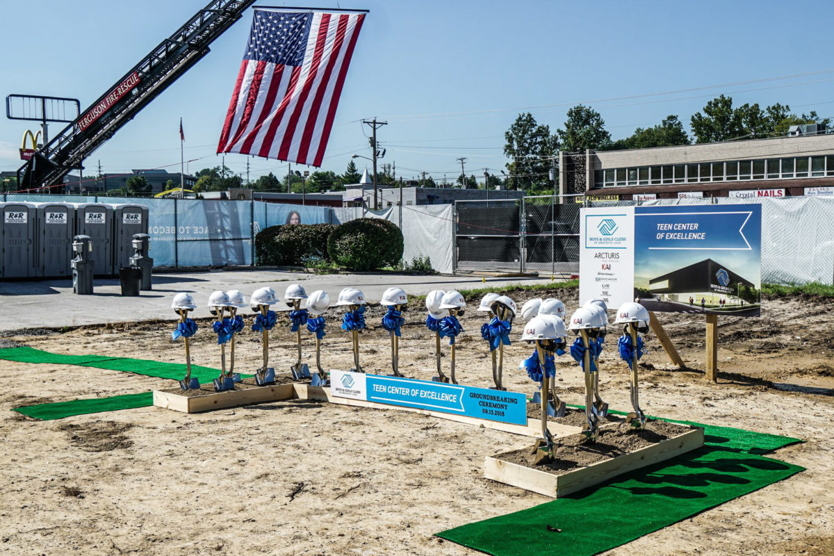 KAI Construction Hats on top of shovels