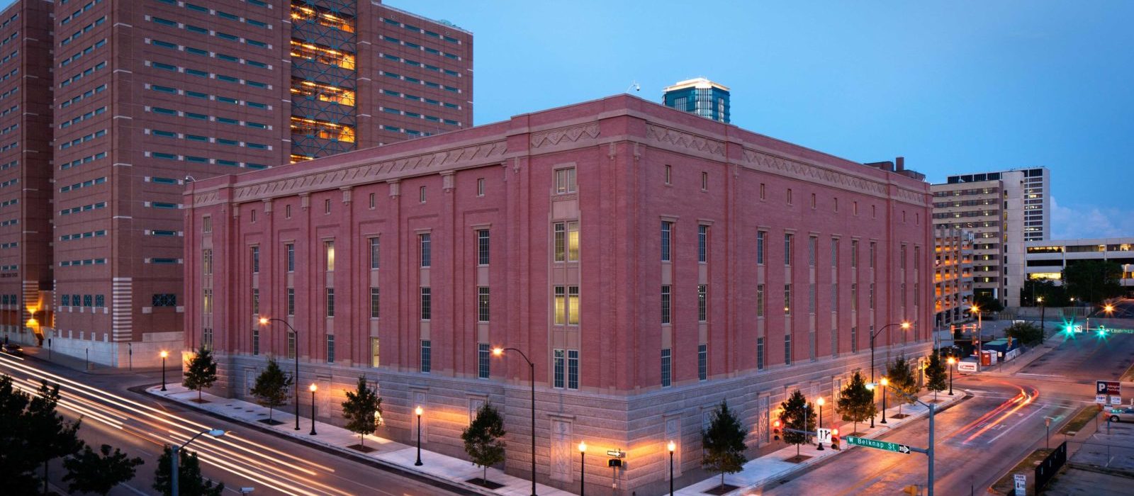 Nighttime side angle view of the Lon Evans Corrections Center