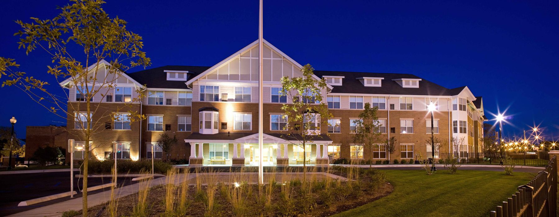 Nighttime Front View of Renaissance Place at Grand Senior Living