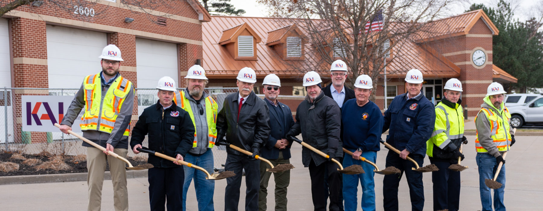 Maryland Heights Fire Protection District Headquarters Engine House One groundbreaking event 11 men about to pour dirt