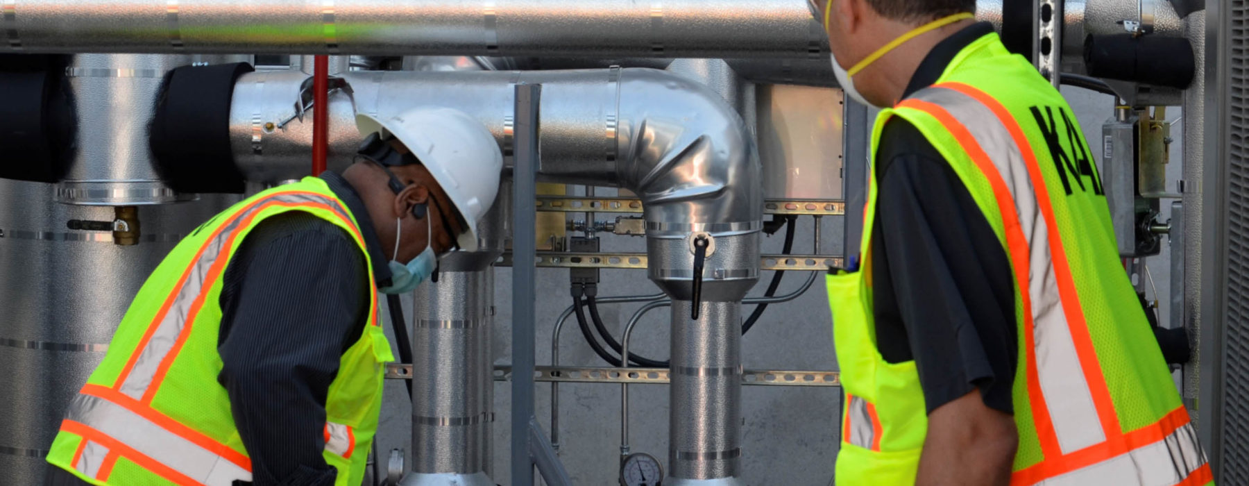 KAI Engineers Working on a HVAC unit