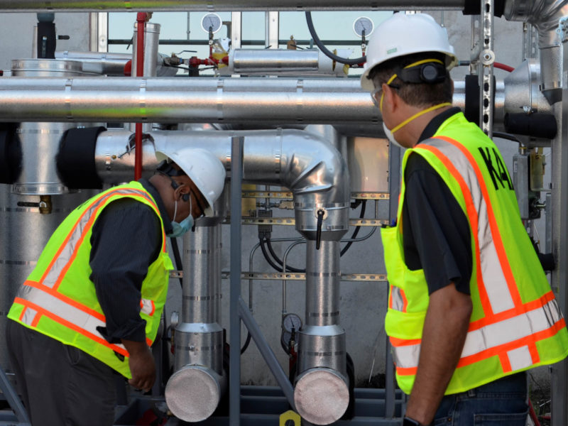 KAI Engineers Working on a HVAC unit